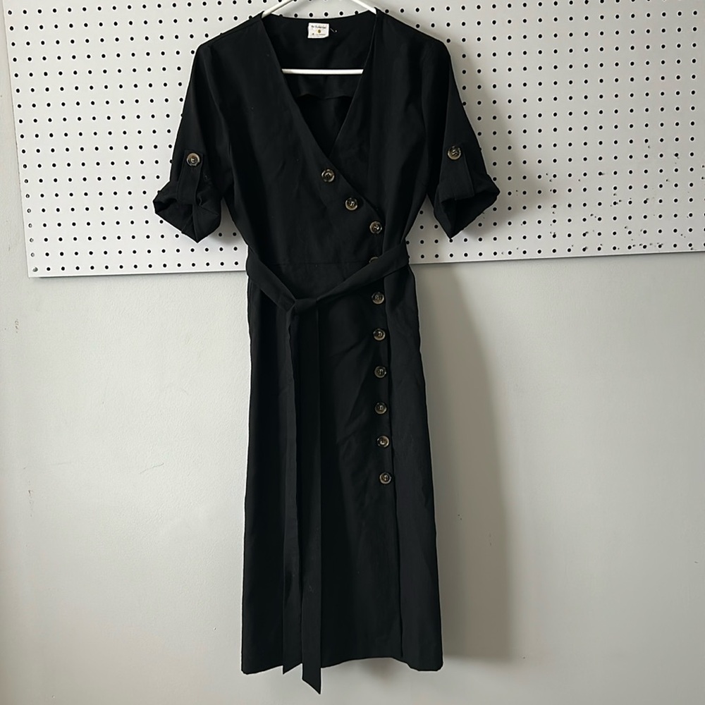 Little black wrap dress with front button detail and waist tie